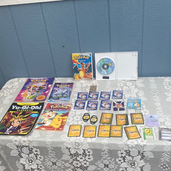 Pokémon cards books and dvds  neopets cards and clips yu gi oh book